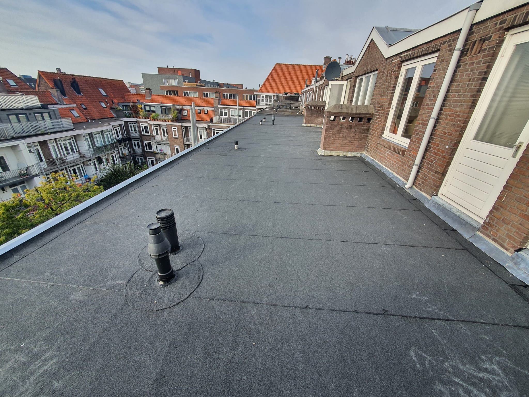 Dakdekker Amsterdam - Bitumen dakbedekking bedrijfspand