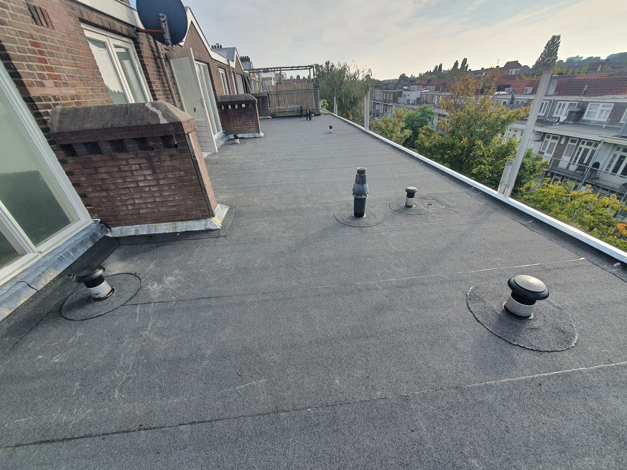 Dakdekker Amsterdam - Afwatering plat dak bedrijfspand